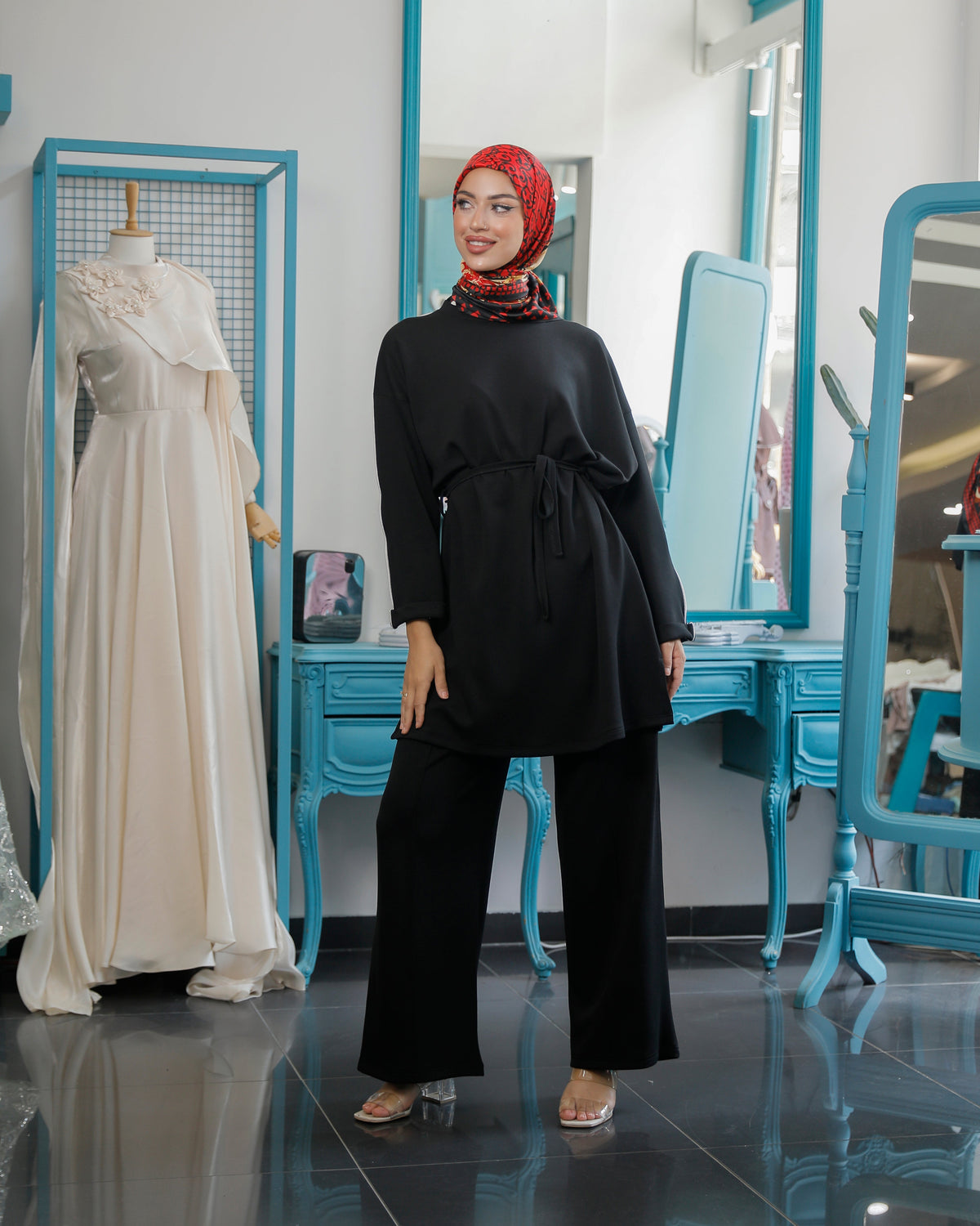Black belted tunic and matching wide-leg trousers from Lameral's selected sets.