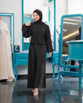 Product photo showing black Skirt Suit with a textured long-sleeve top and a straight long skirt