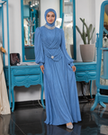 Blue Serena Draped Gown with layered draping and embellishment at the neckline and hip