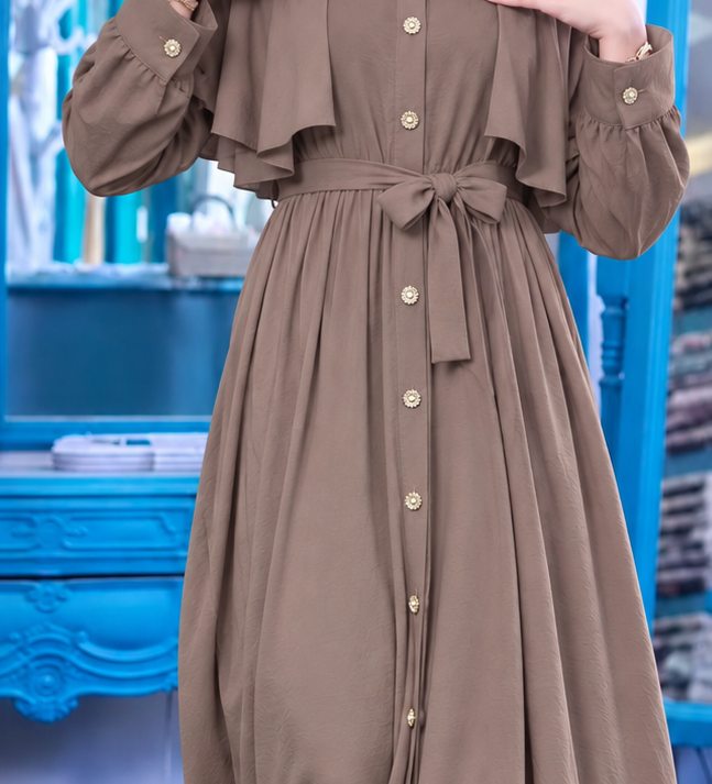 Close-up of Cape Shoulder Button Dress, cropped directly from the original product photo.