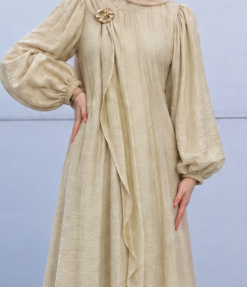 Close-up of Draped Brooch Dress, cropped directly from the original product photo.