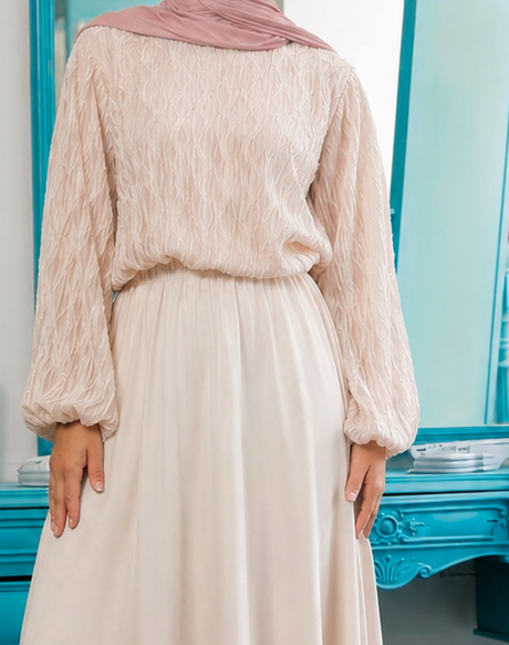 Close-up of Skirt Suit showing cream textured blouse, gathered sleeves and waist seam, cropped from the original product photo.