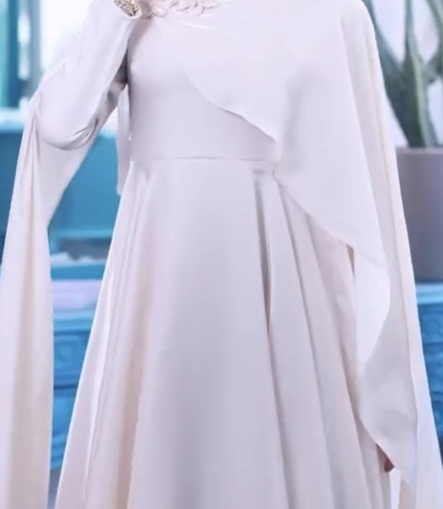 Detail of The Camellia Dress, cropped directly from the original product photo.